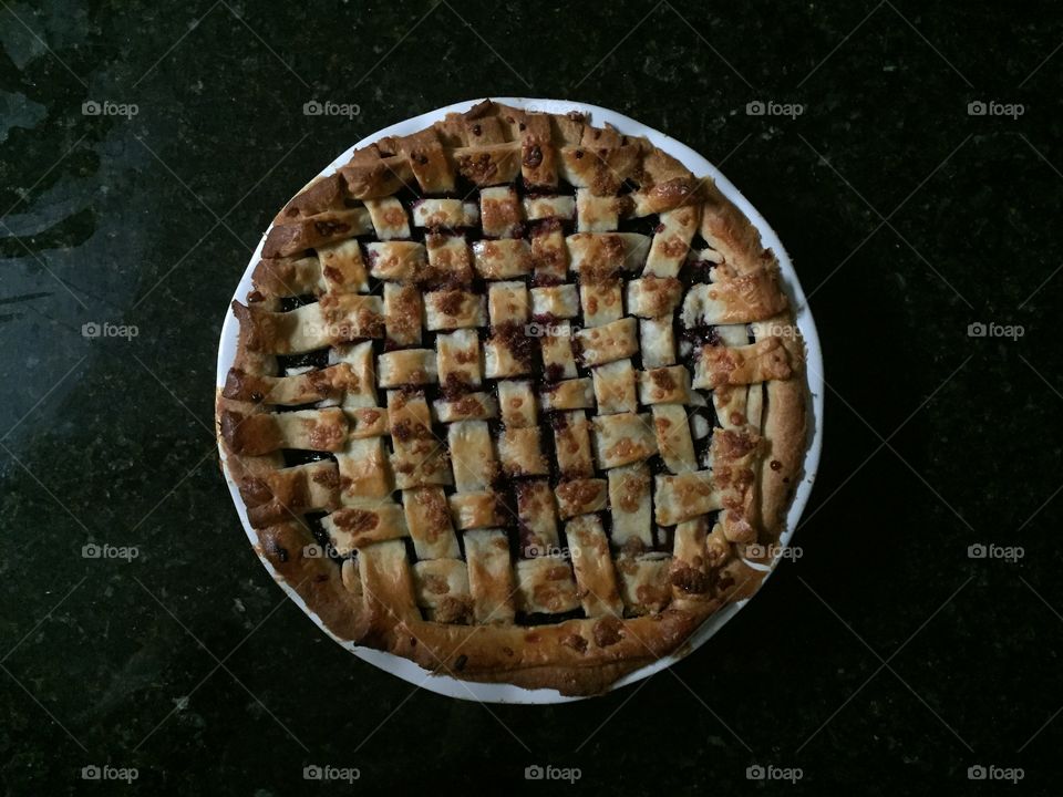 Homemade berry pie. Berries picked by hand from nearby stream. Dough from scratch. 