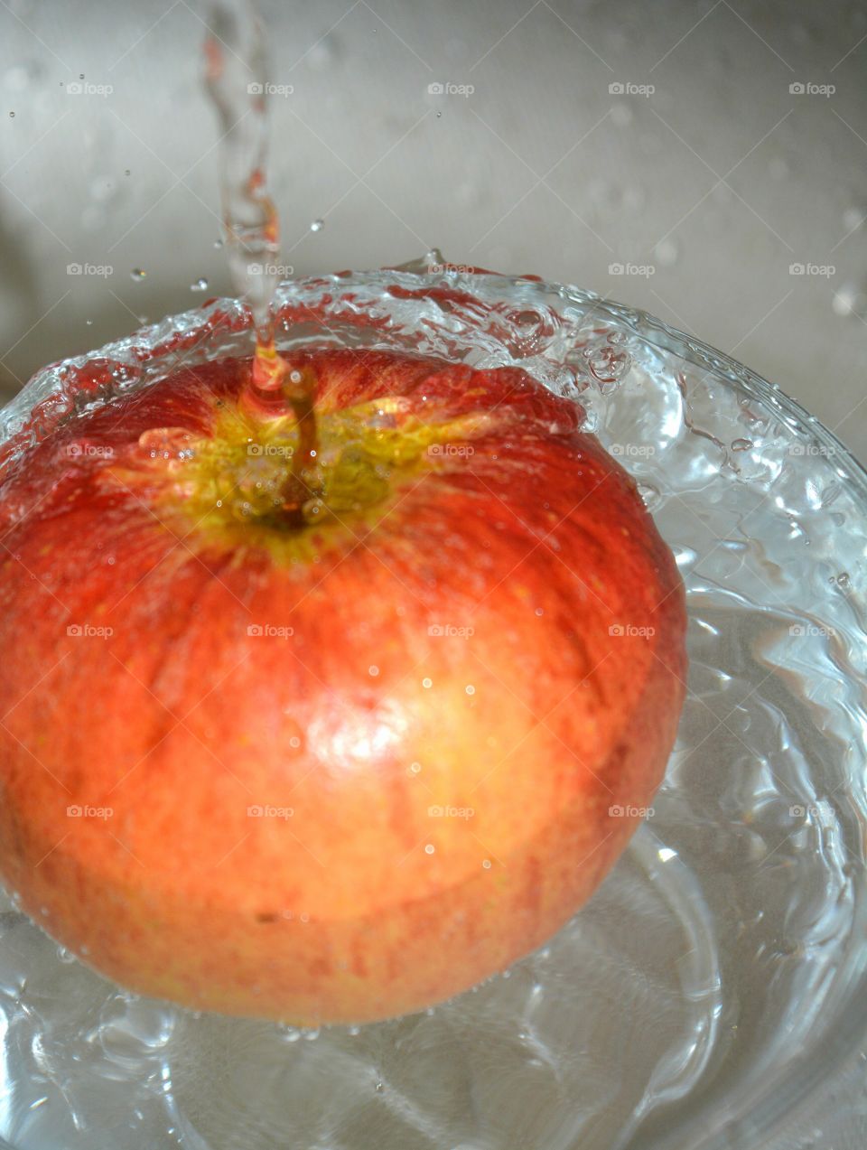 Close-up of apple on water