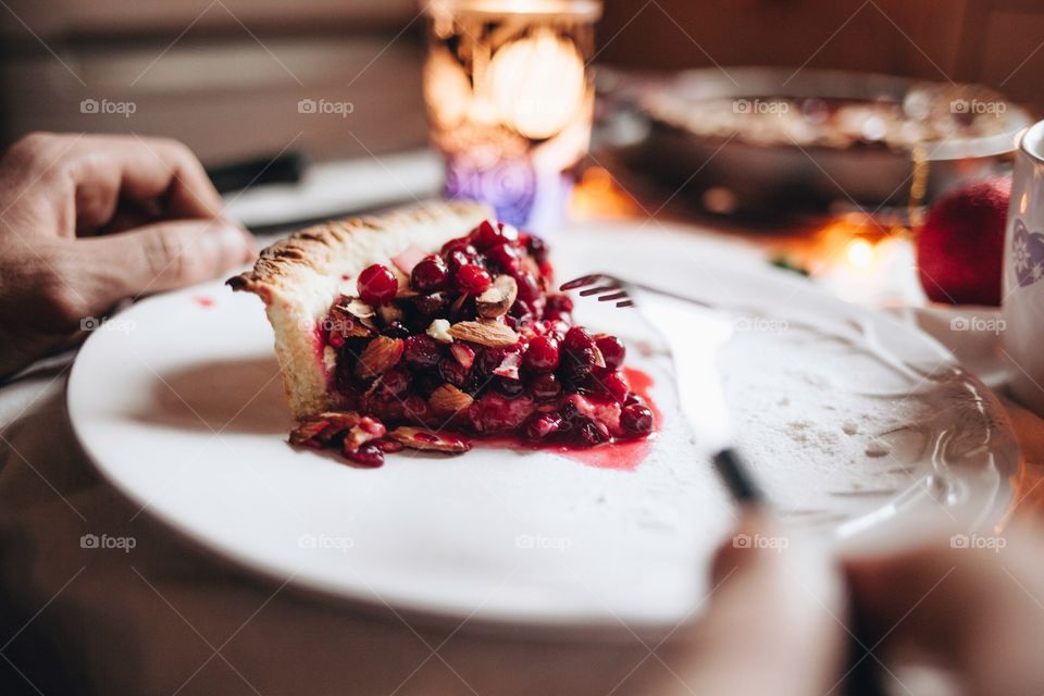 Person eating dessert