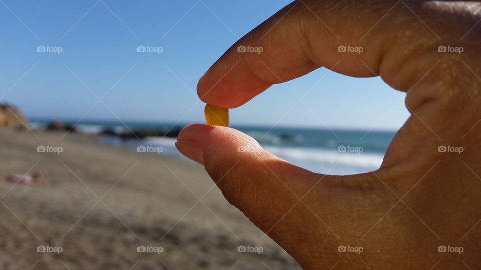 Beach activities, Teasure hunting, looking for the prettiest pebbles on the beach.