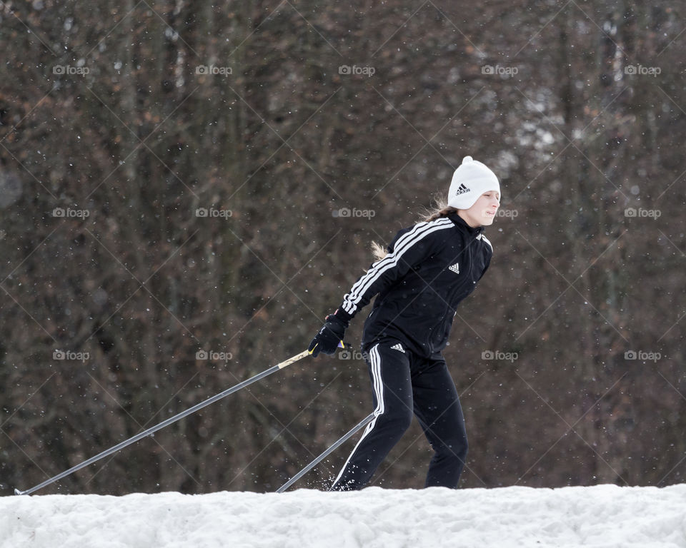girl skier on the track
