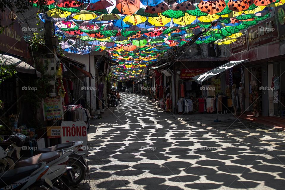 Colorful umbrellas with shadows 