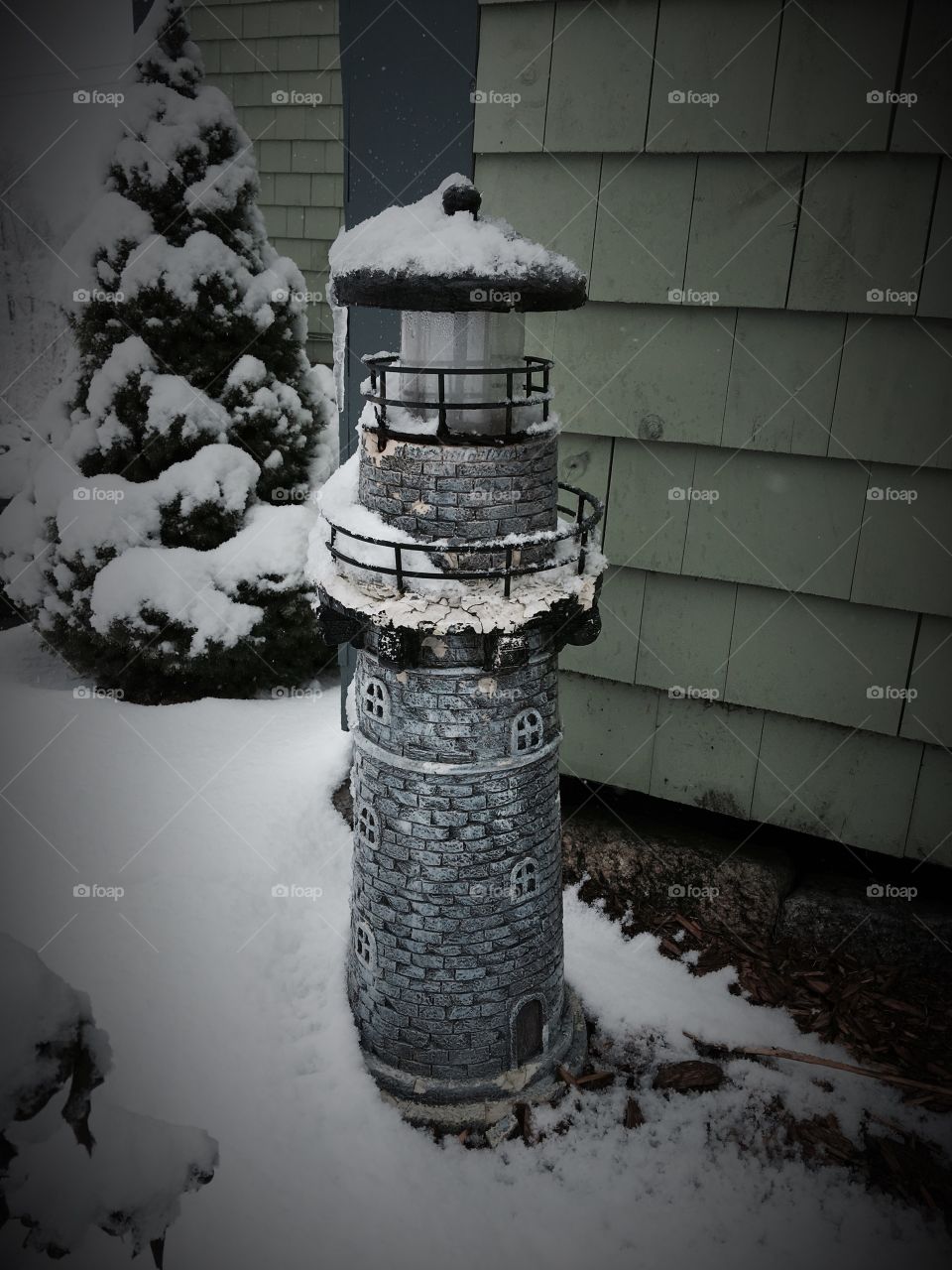 This snow and ice covered lighthouse shows the beauty of VT