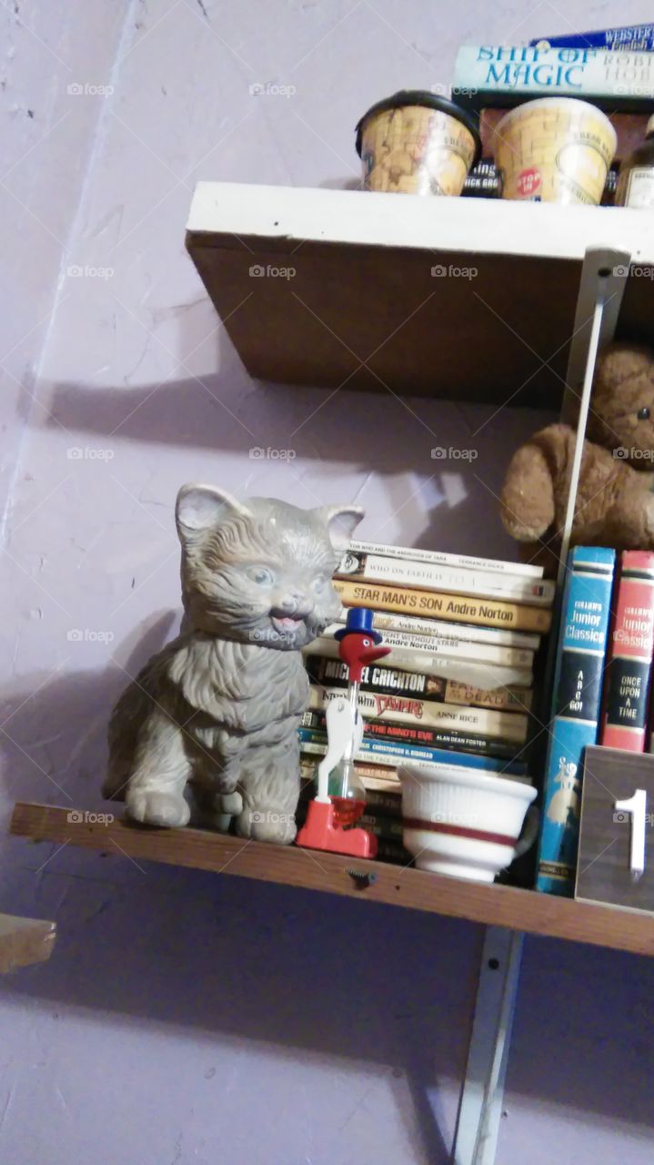 cat kitten toy vintage squeaky bird books weather weathered