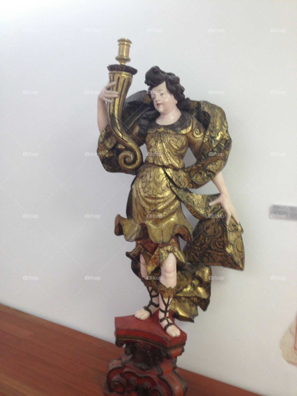 Golden female statue