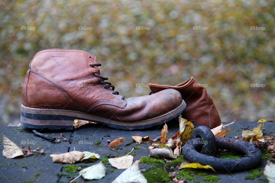 Boots and autumn background