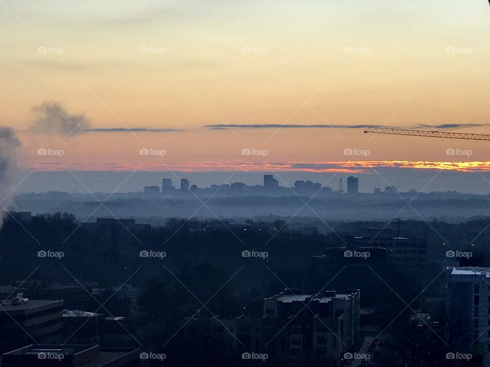 Glistering sunrise emerging from the fog