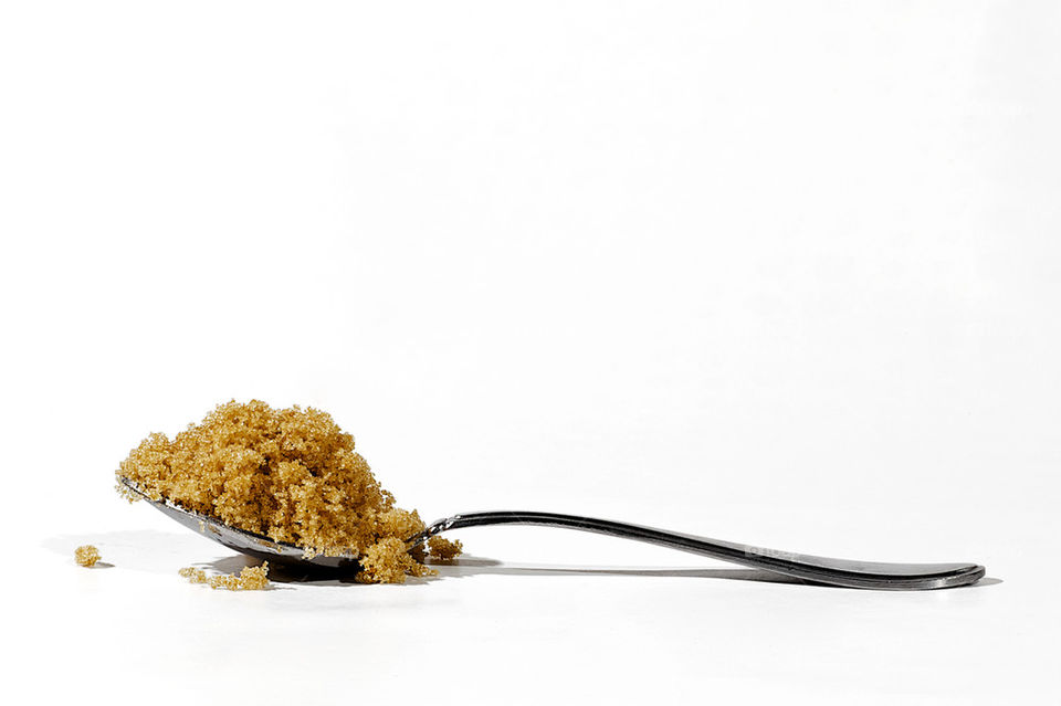 Brown Sugar Served On A Silver Spoon