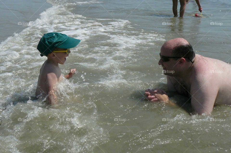 playing in the ocean