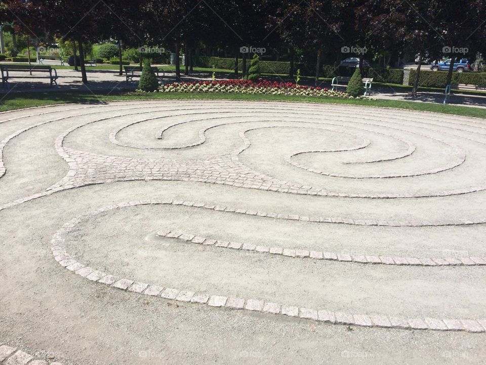 A simple Labyrinth at the park. This playful art is fun. It adds an element of interest 