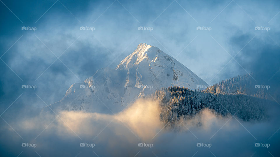 snowy mountain in rising sun