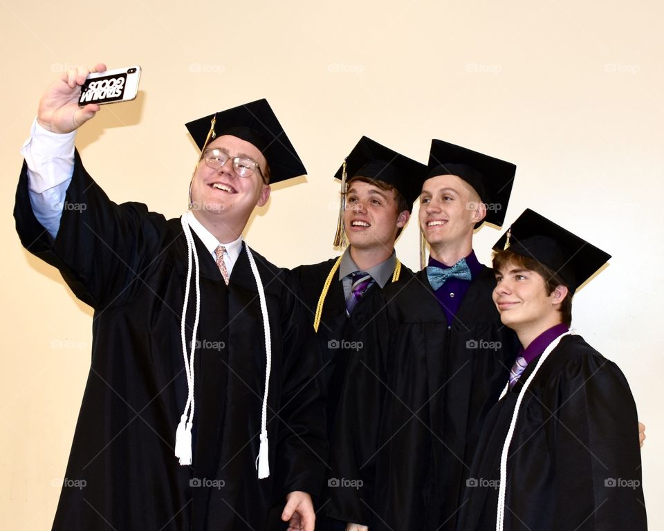 Graduates taking a selfie