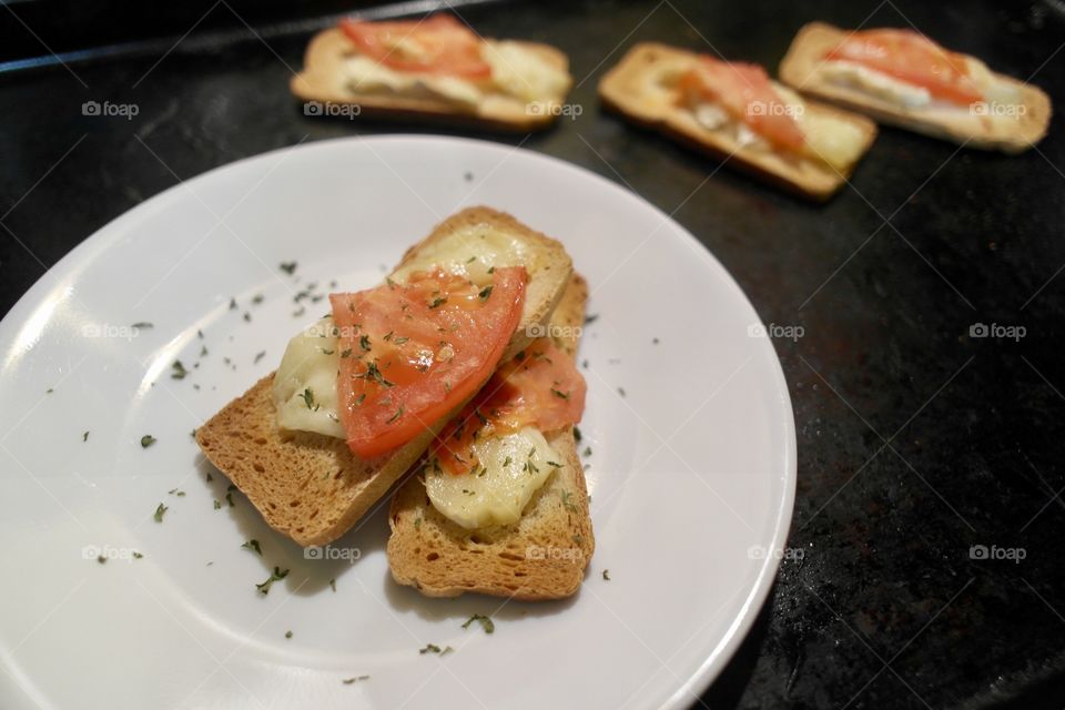 Tomato and cheese on toast 