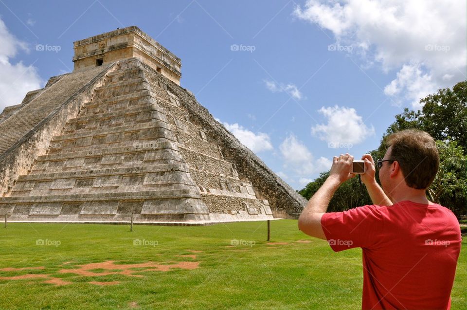 Man taking photo in chichen itza