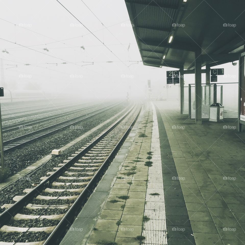Foggy German train station. Hirchgarten s-Bahn covered in fog.