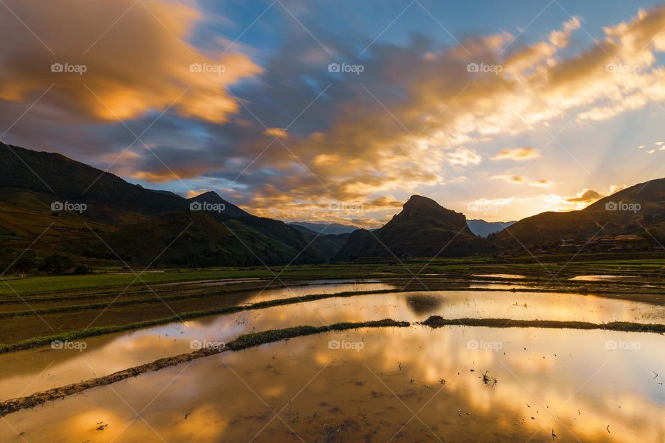 Sunrise in Lim Mong valley with dramatic sky and clouds