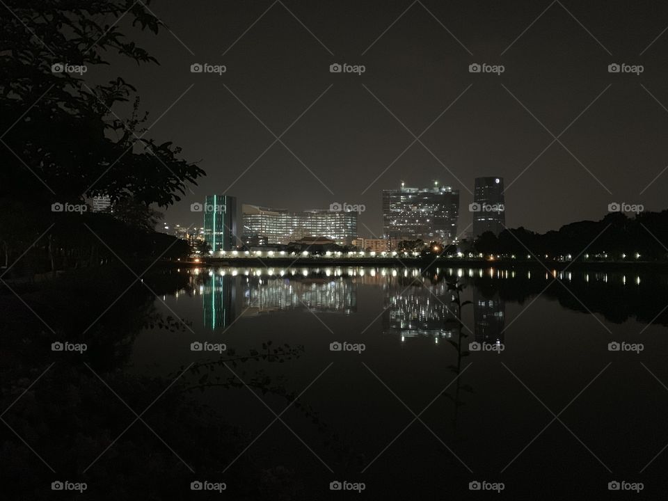 Almost black mode with nice lighting from the building at night in Bangkok