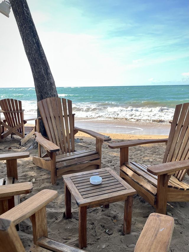 Wooden outdoor living room on a sandy beach in the Caribbean