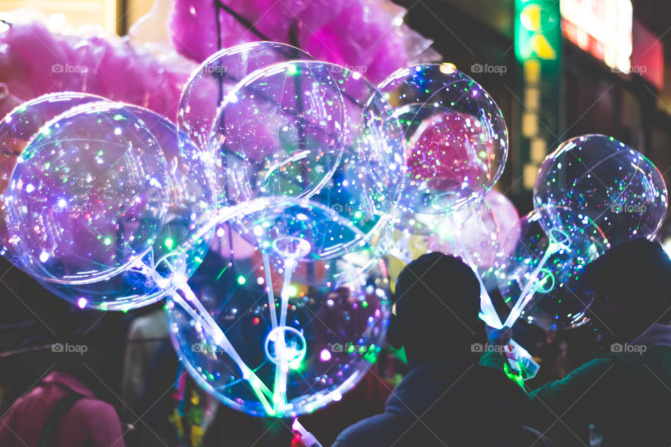 Blurred surface bubbles. Christmas bokeh background. Color unfocussed lights. circular bokeh sparkle glitter lights background. Happy New Year concept