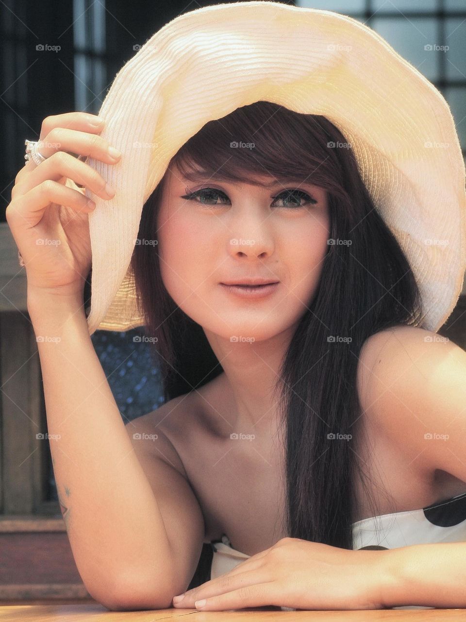 A concept portrait with a beautiful model with his smile