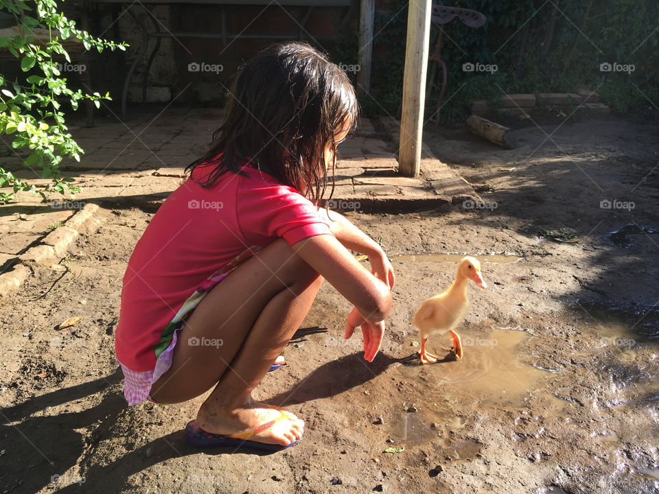 little girl playing with her best friend