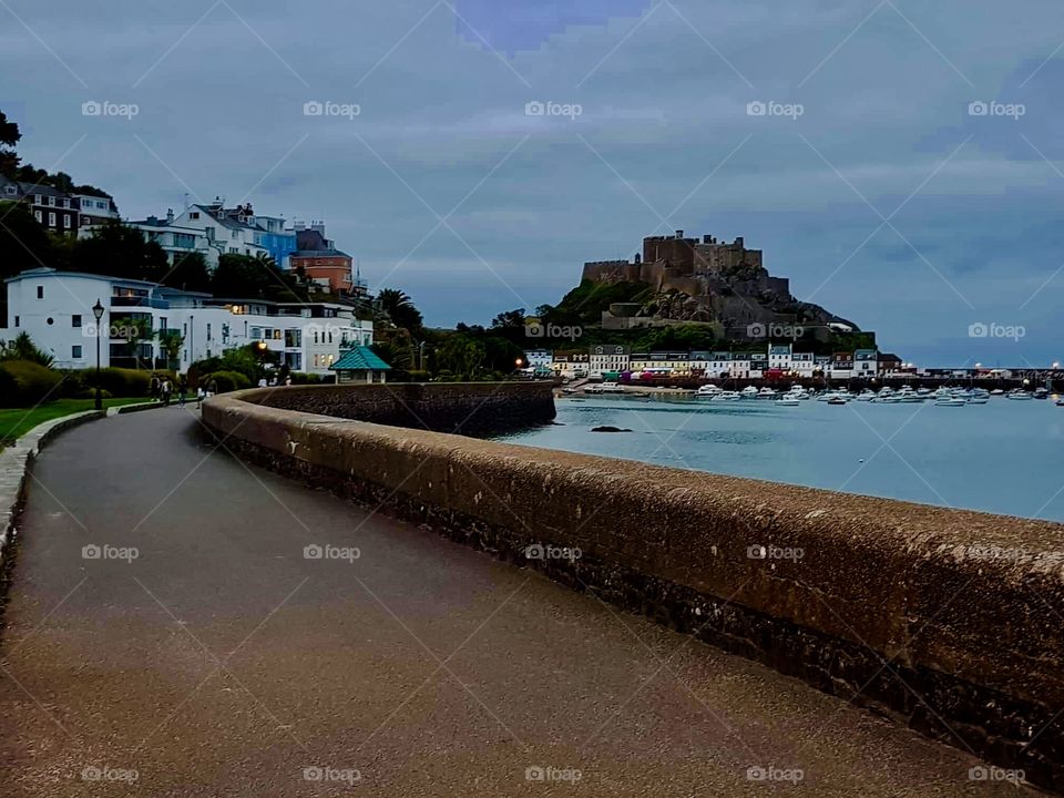 Landscape of the sea view at dawn and the road of the great Gorey Castle which is shown in the photograph