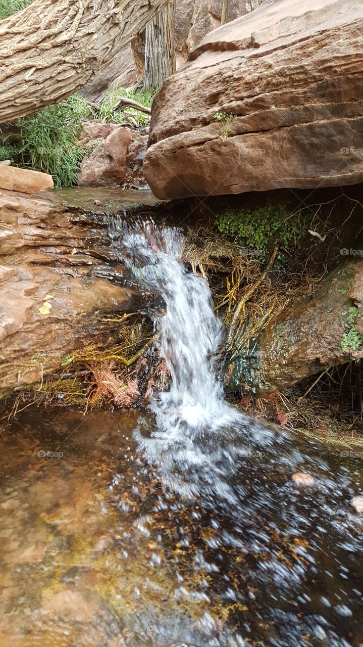 where the water flows through the red rocks of Utah