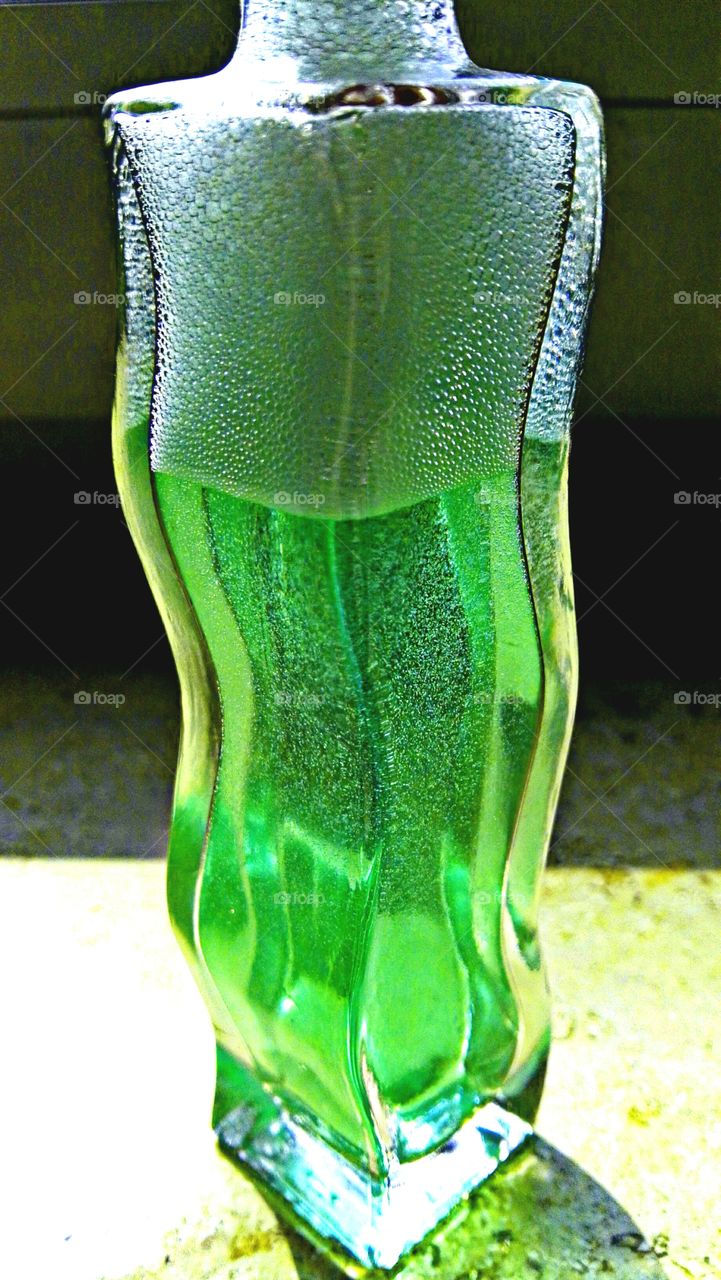 green bubbles in bottle