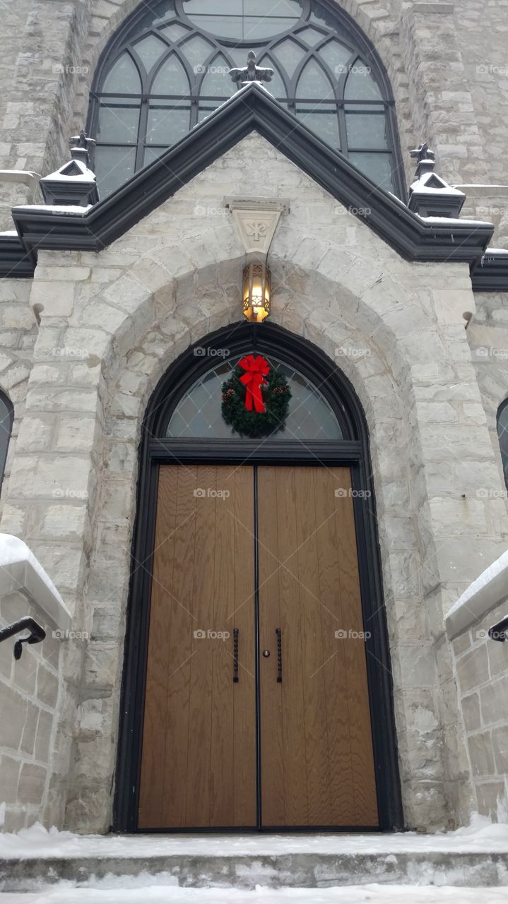 Church door with Christmas wreath
