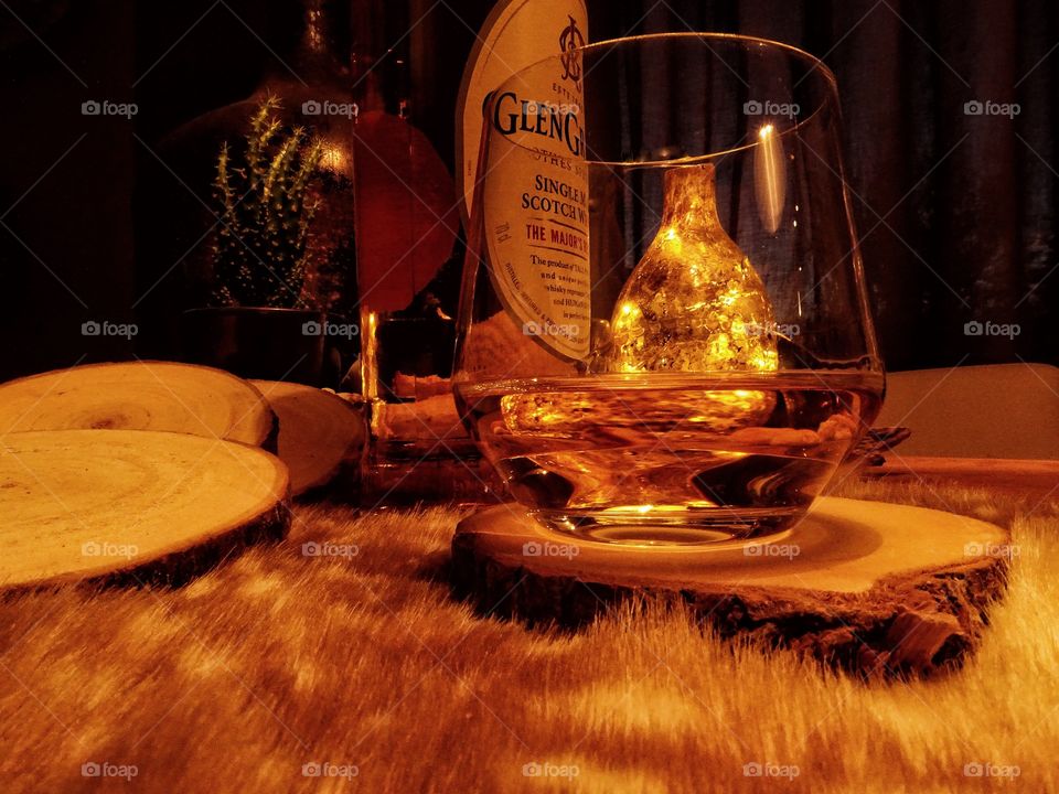 Whisky bottle and glass