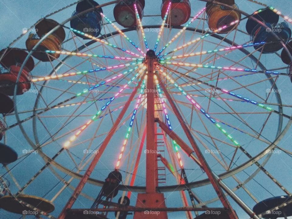 Ferris wheel in Denver, CO. Wonderful night with lots of colors. 