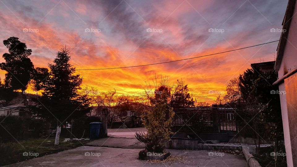 It's a photo with a special sunset once a year.