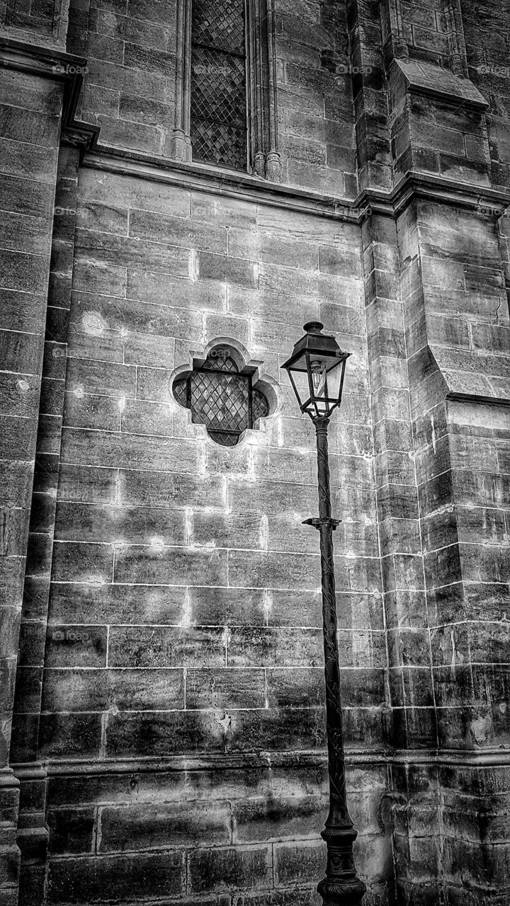 Church and lamp post at St Foy la Grande, France