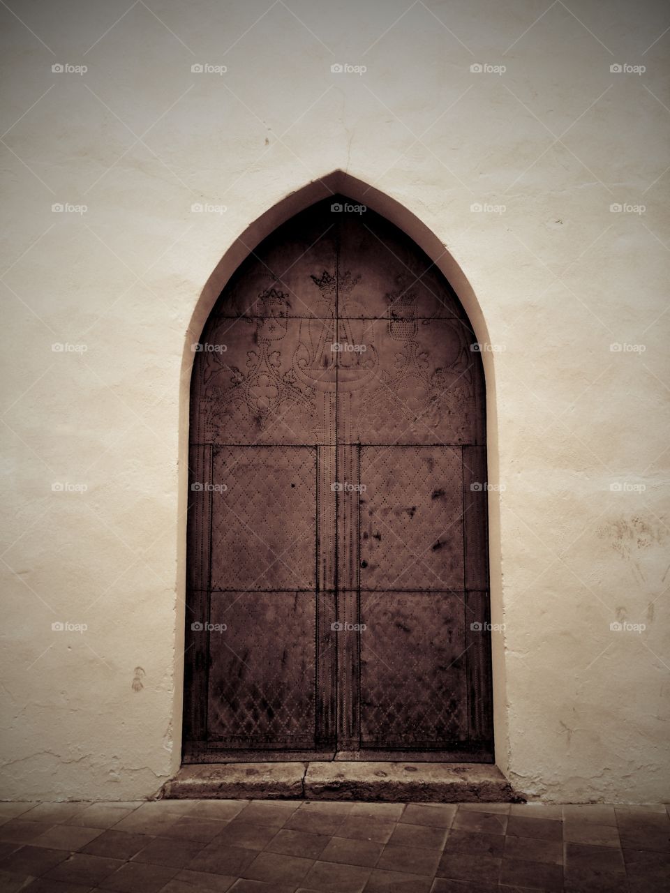 Palace portal. An arabic style portal in Spain, sepia.