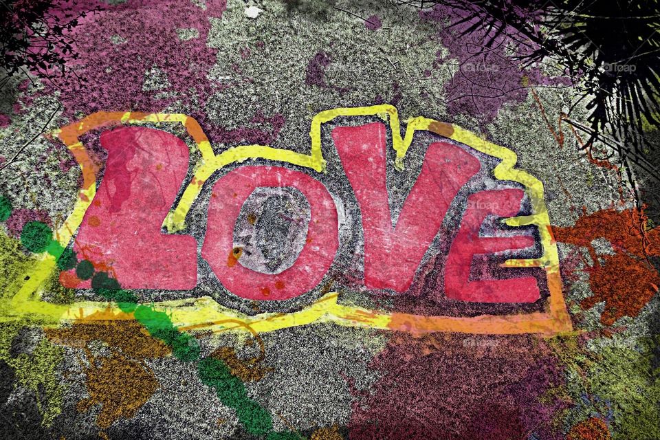 Love spelled out in multicolored graffiti.