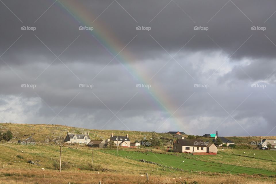 Rainbow over the countryside 