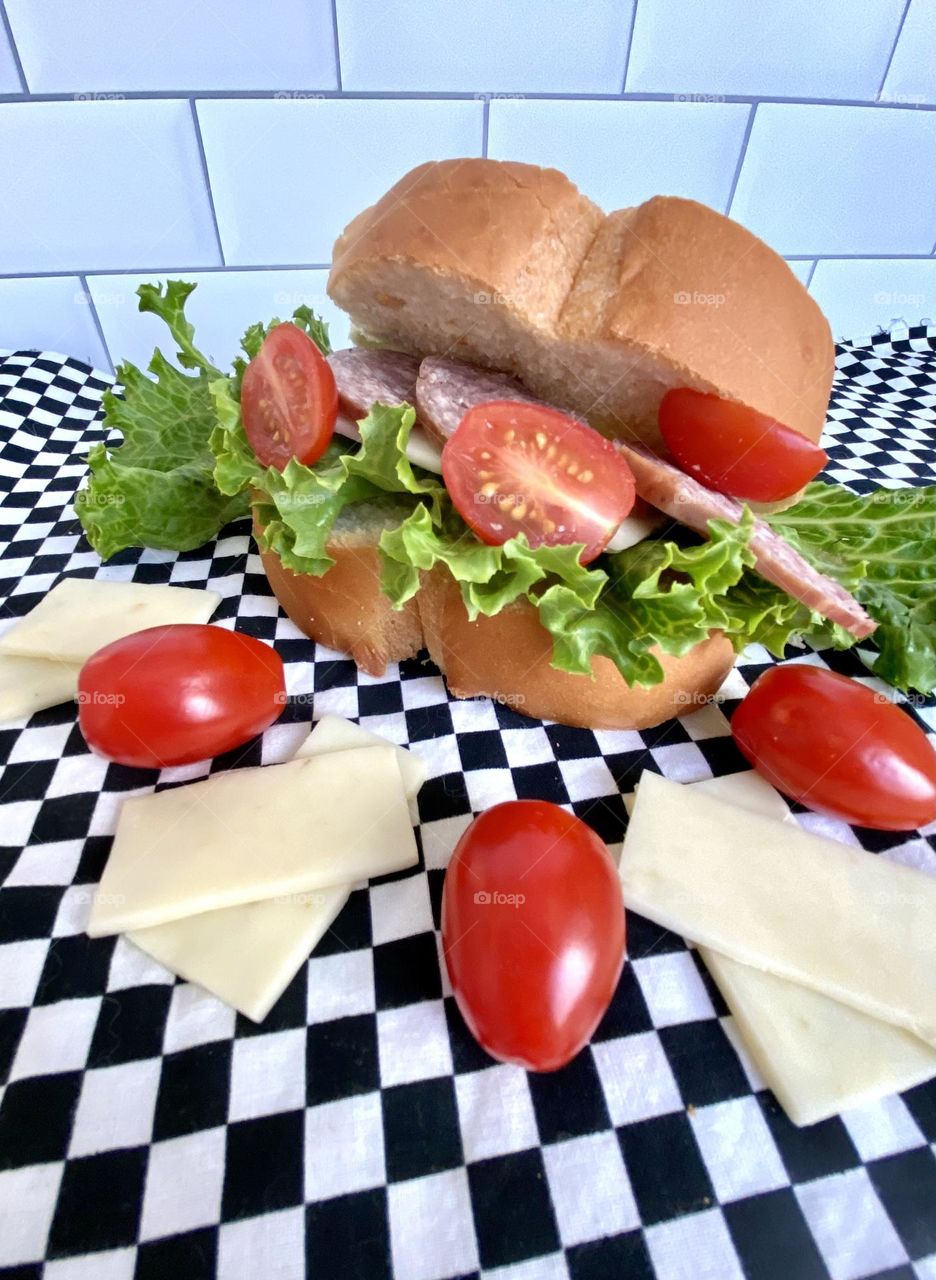 Delicious sandwich with tomatoes and cheese