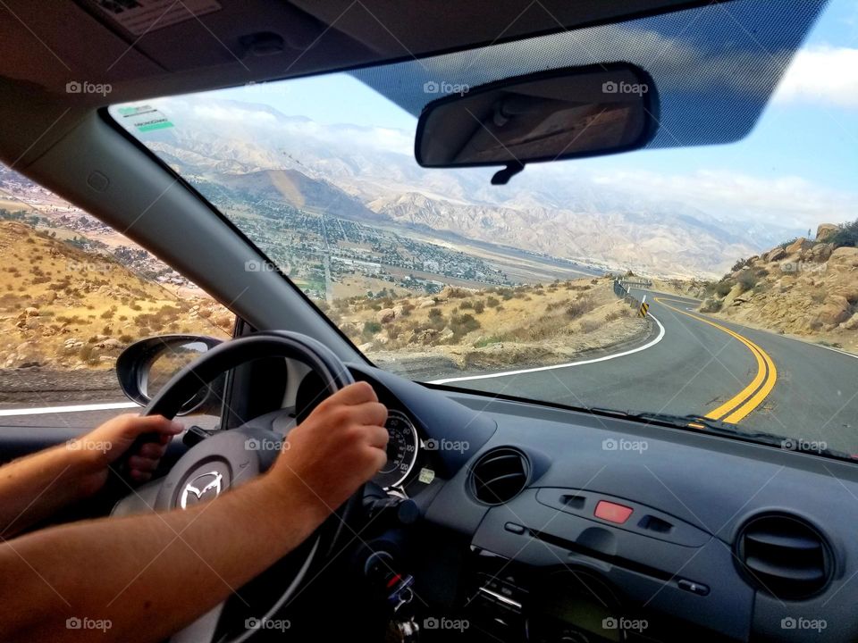 Life in Motion: driving down a mountain road.