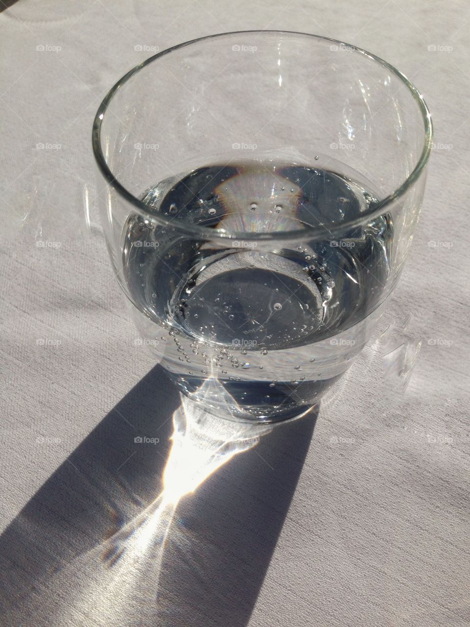 Glass of water in the sun