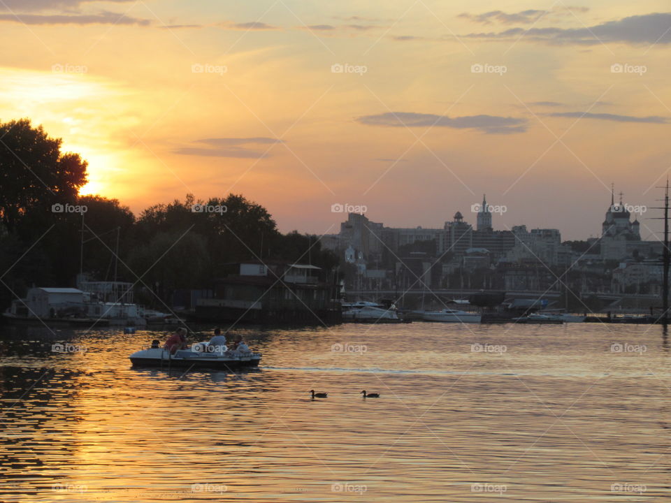 sunset on the Voronezh River in the city reservoir