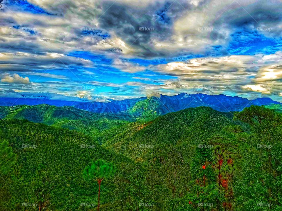 its autumn season, full of green forest and blue hills and snow white mountains, blue sky and cloudy moment, natural, Nepal