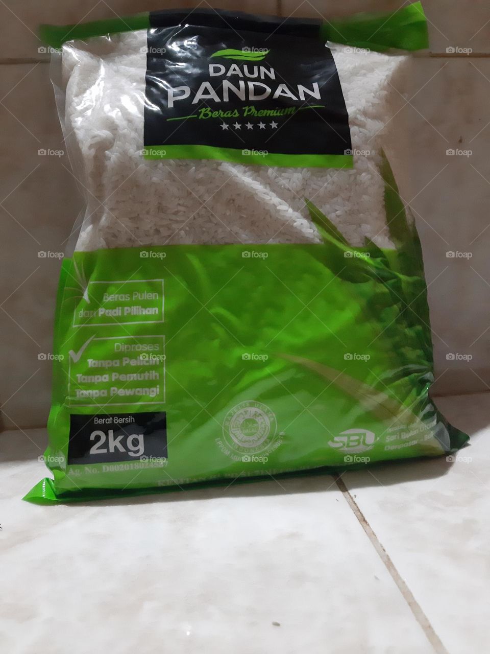 A green pack of premium rice