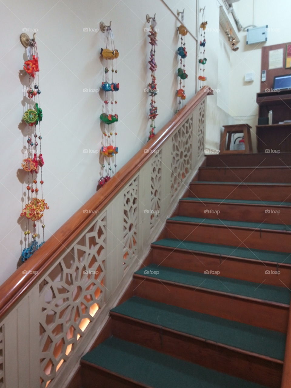 decorated wall beside stairway