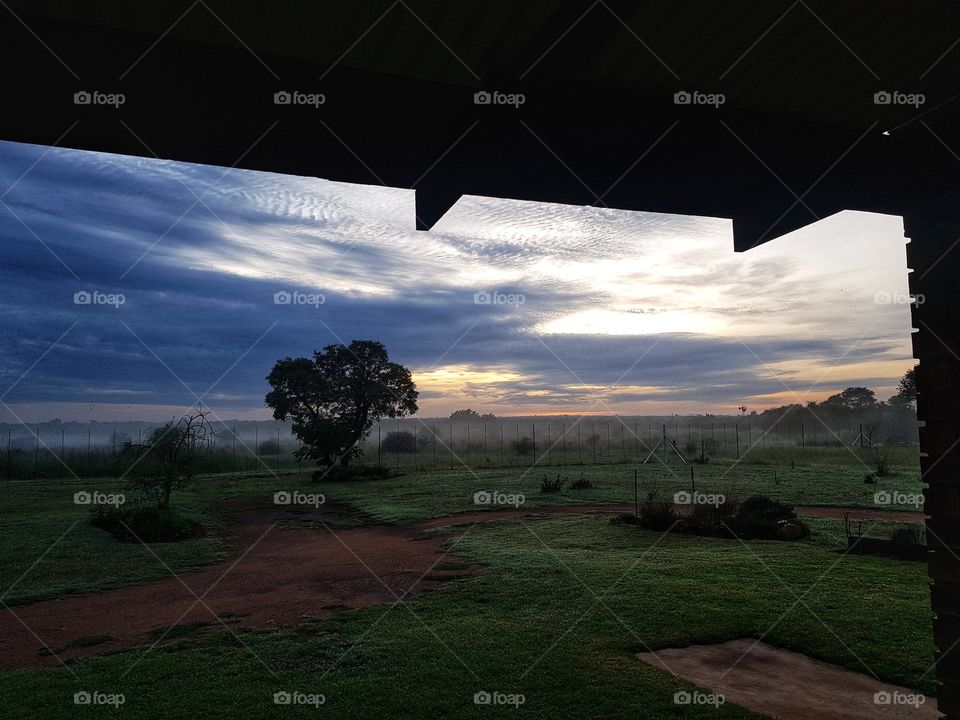 Sunset on a small farm.