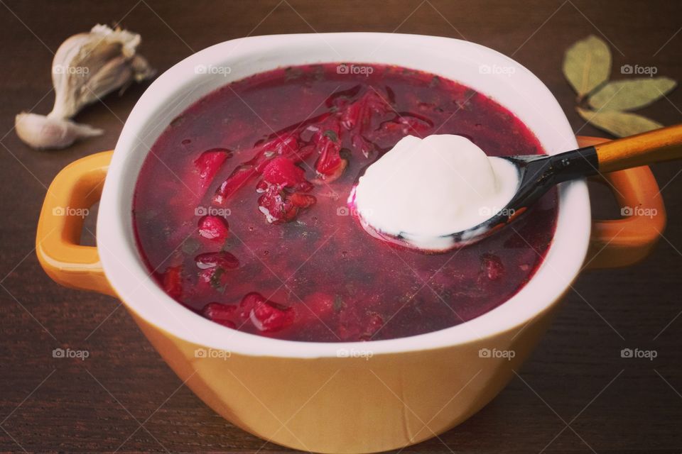Delicious soup with beet and sour cream