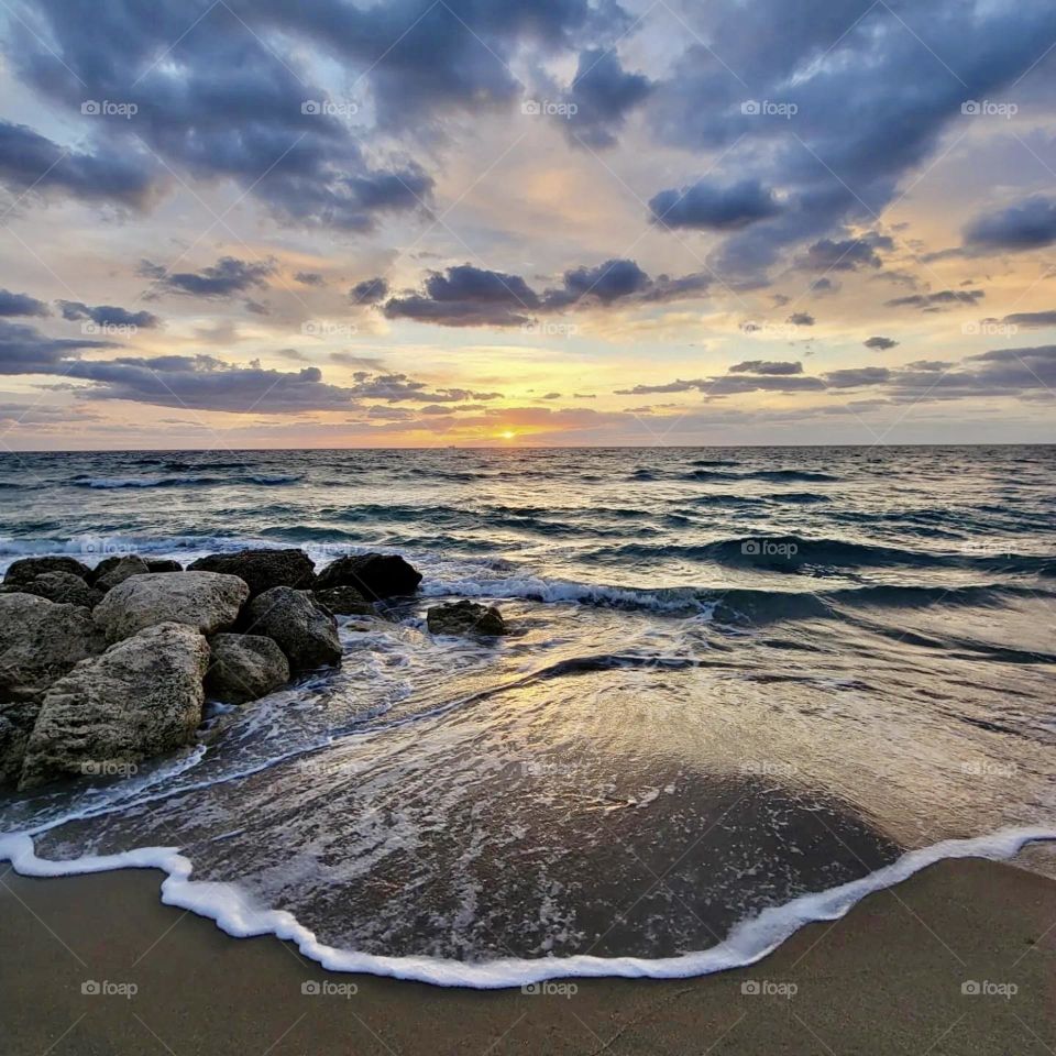 Look at this amazing sunrise. The clouds were perfect. The water was perfect. Absolutely amazing moment to capture. 