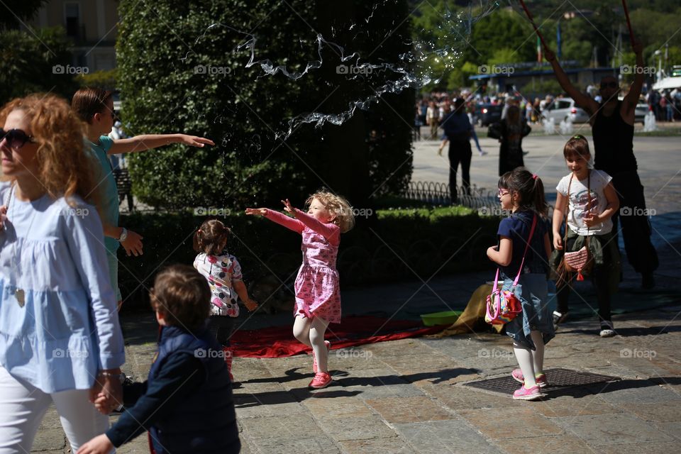 Children playing bubbles 