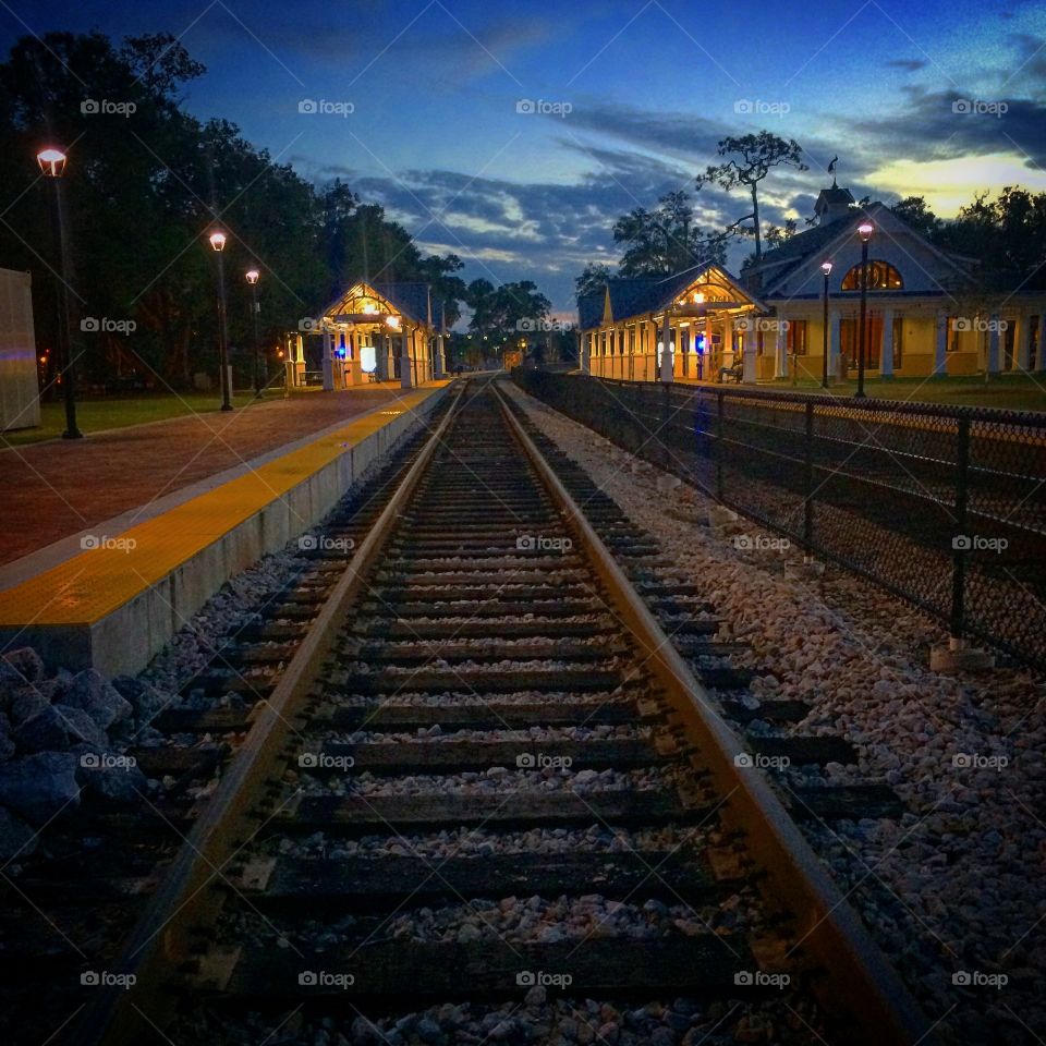 Empty rail track at night