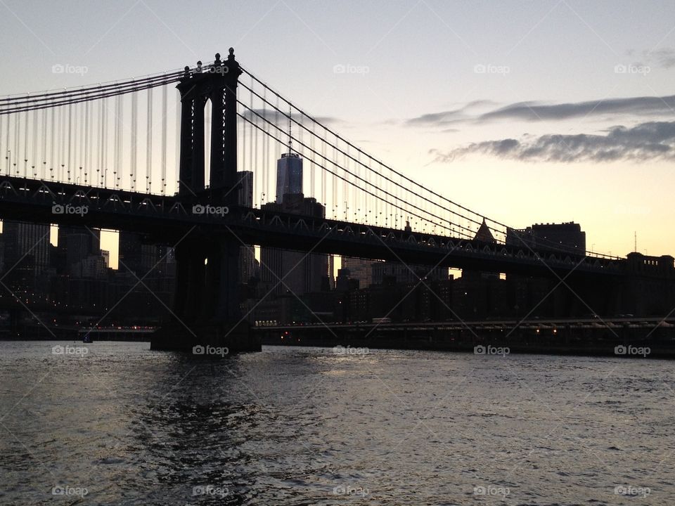 A fantastic landscape silhouette of Manhattan from the bay