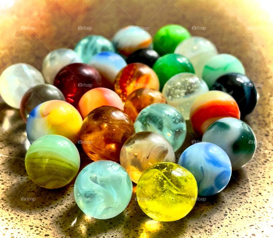 Glass marbles, collection of antique and vintage, multi colours, selective focus, concept childhood, hobby, collectibles, history 